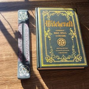Witch craft book and incense holder